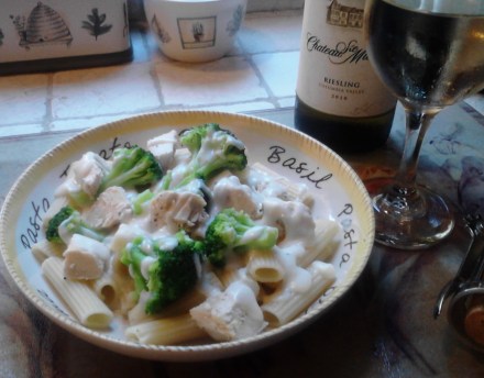 Homemade broccoli and grilled chicken with alfredo sauce